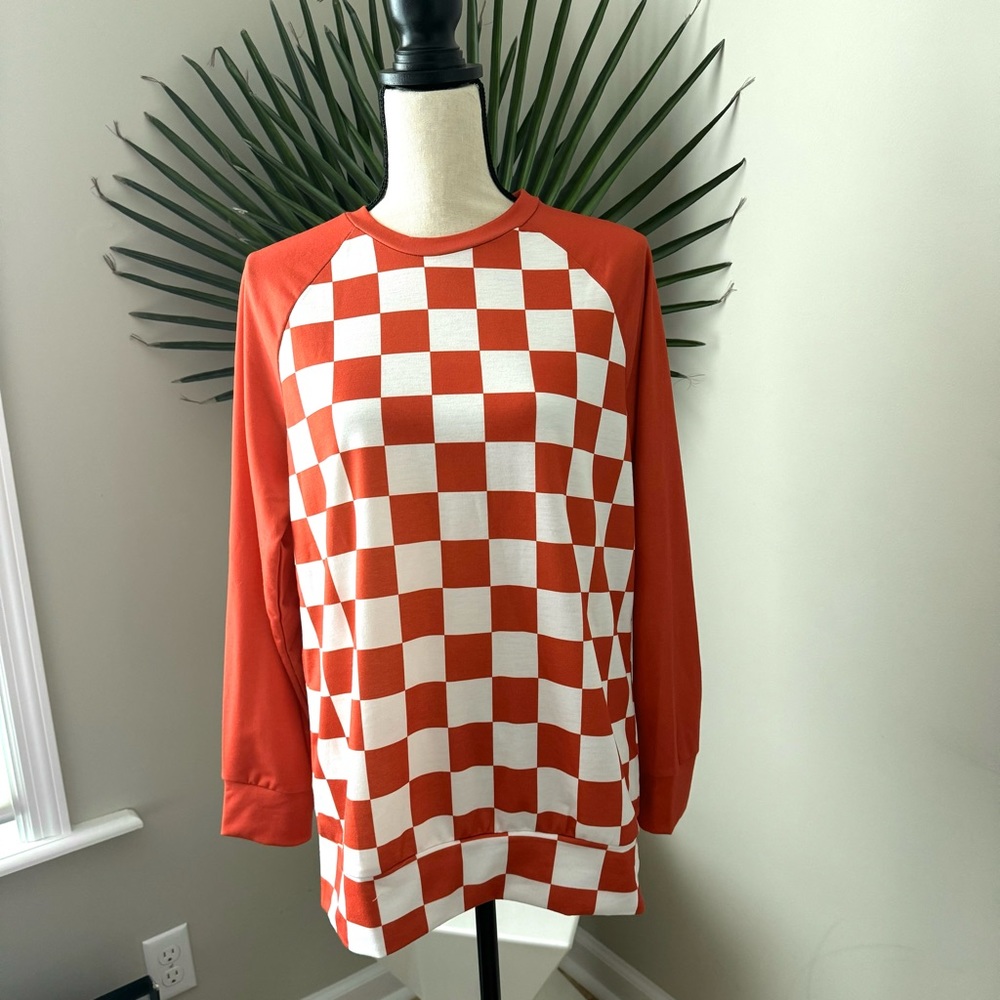 Orange and White Checkerboard Pull On Shirt. Size M